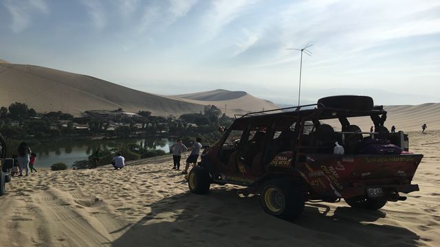 Dune Buggy And Sandboard In Huacachina